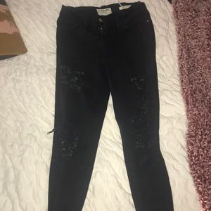 black ripped jeans